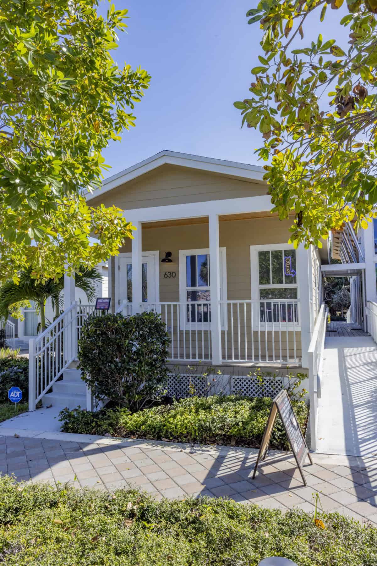 Charming house on Styx Promenade with lush greenery in West Palm Beach.